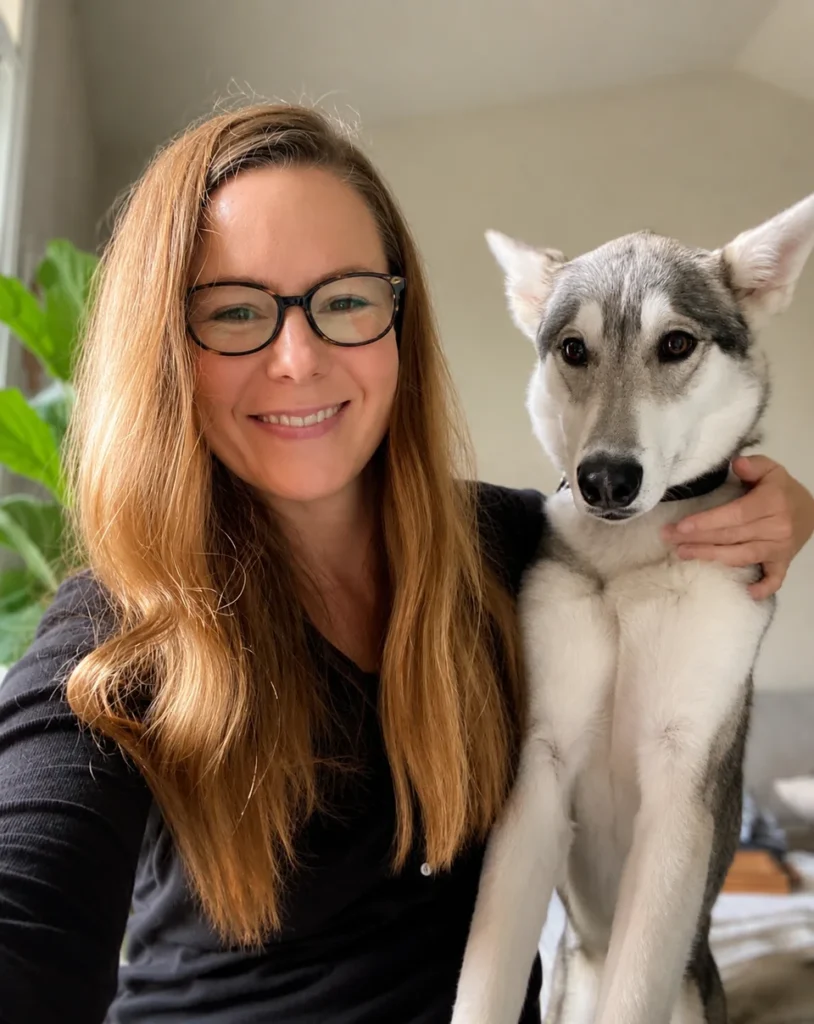 Hope and Echo, Elite Pet Care Service co-founder with her Husky puppy in Charlotte NC